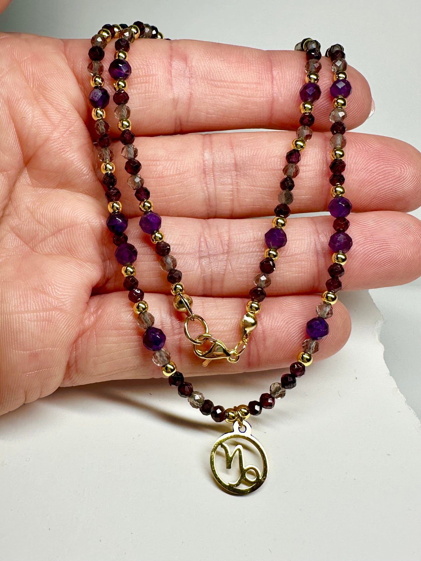 Capricorn Zodiac Necklace – Smoky Quartz, Garnet & Amethyst | Handmade Crystal Jewellery for Grounding & Ambition