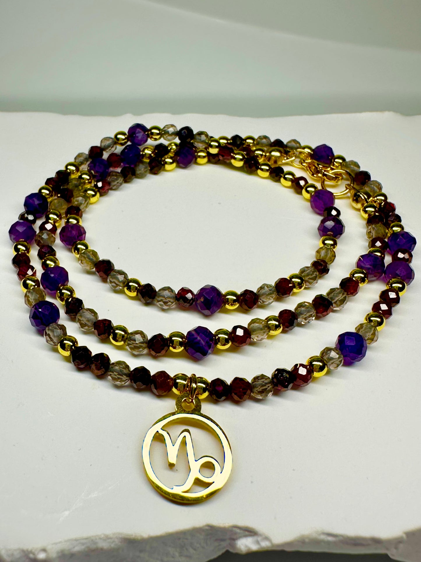 Capricorn Zodiac Necklace – Smoky Quartz, Garnet & Amethyst | Handmade Crystal Jewellery for Grounding & Ambition